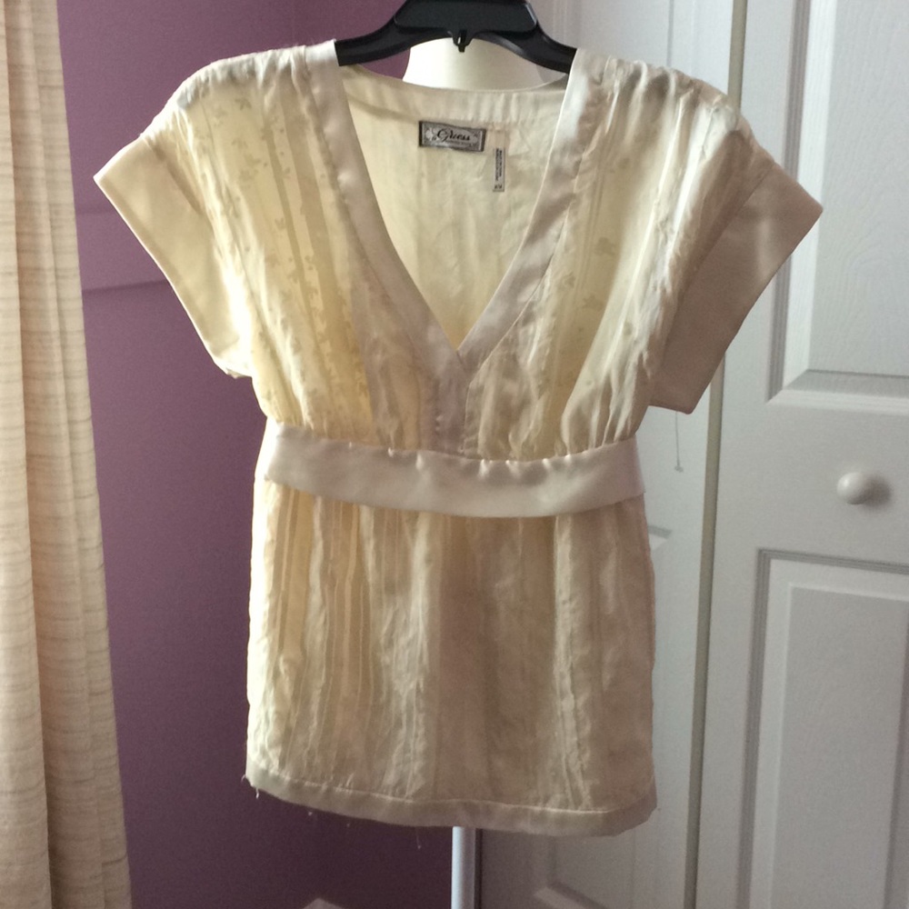 NWOT Guess satin trim and lined top.